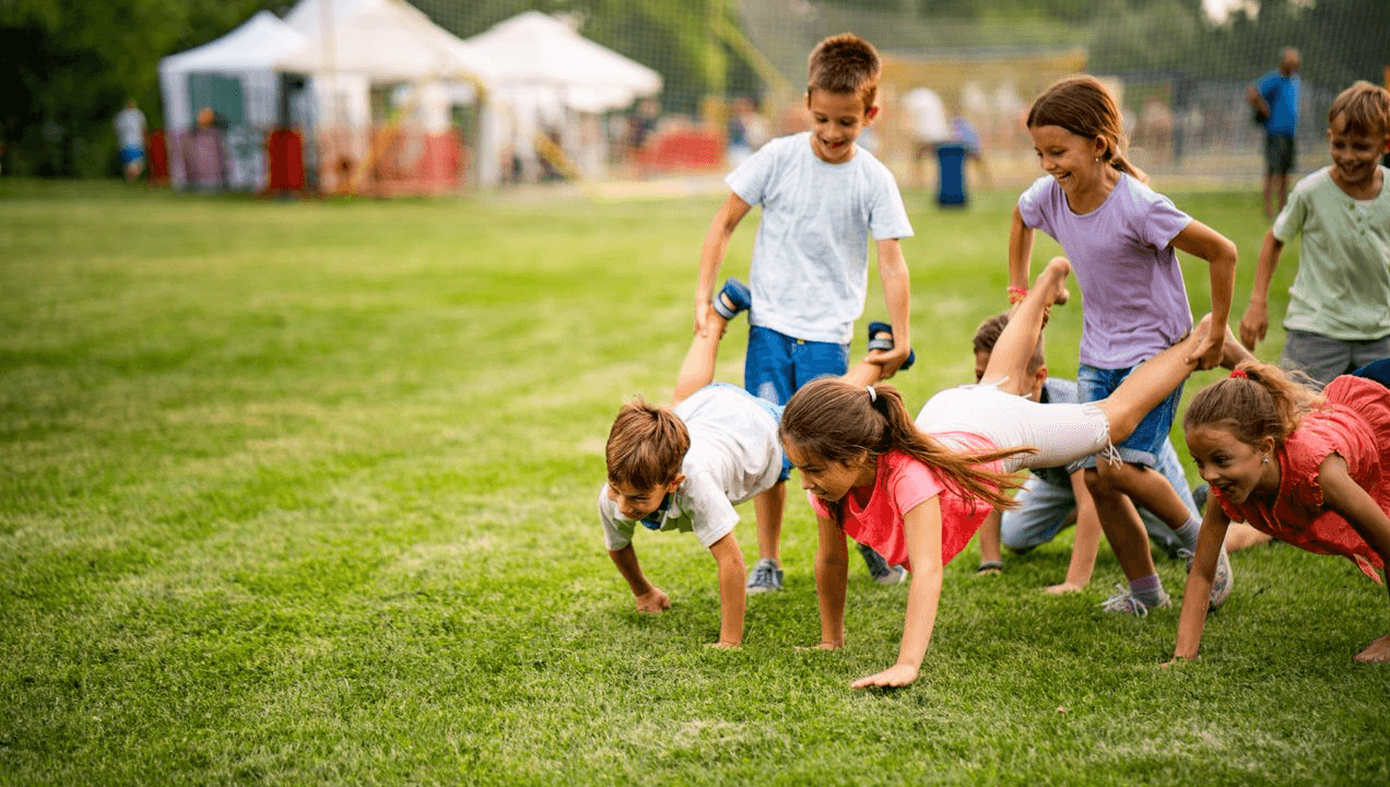Kids playing in a field.